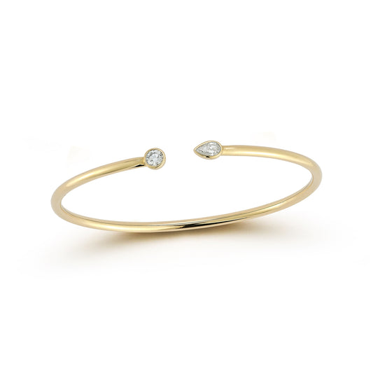 Flexible Open Bangle with a Bezel Set Round and Pear Diamond